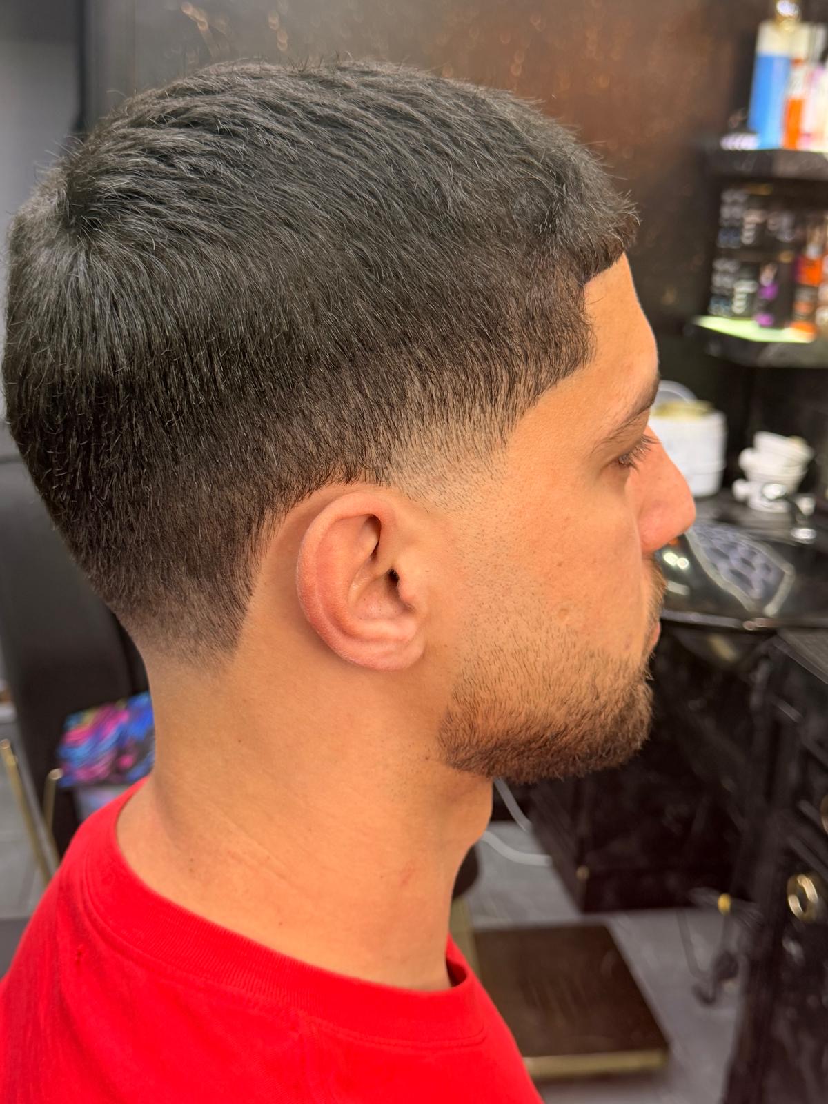 Side view of a clean taper fade haircut at Xalo Barbers in Cricklewood
